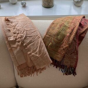 Two pashmina scarves. Lovely to the touch.